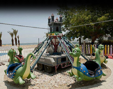 קרוסלת דינוזאורים