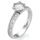 טבעת אירוסין "אפרת" מיוחדת במינה, הטבעת מעוטרת בחריטה בעבודת יד וב 20 יהלומים במשקל של כ 0.1 קרט בצבע G וניקיון SI1.