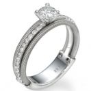 טבעת אירוסין "ג'ניפר" המעוטרת בסלילי זהב 18K ויהלומים צדדים בעיצוב ייחודי לברוורמן תכשיטים.