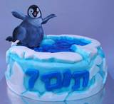 פינגווין מהסרט "תזיזו ת´רגליים" - לתום בן ה-7 - סוכריה מצויירת על עוגה