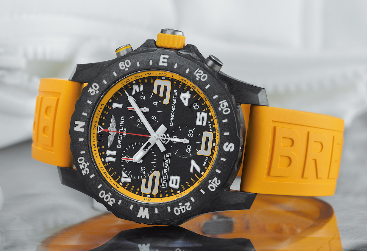 Breitling endurance pro. Часы Breitling Endurance Pro. Breitling Endurance Replica. Breitling Replica Orange. Breitling Endurance Pro женские.