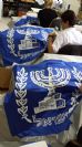 תפירת דגלי נס הנשיא