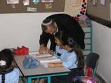 Rabbi Helman, Superintendent of the Board of Education, visits our school